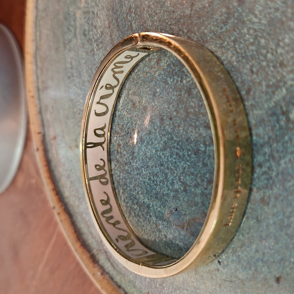 Kate Spade Idiom Bangle " CREME DE LA CREME” in cream & gold